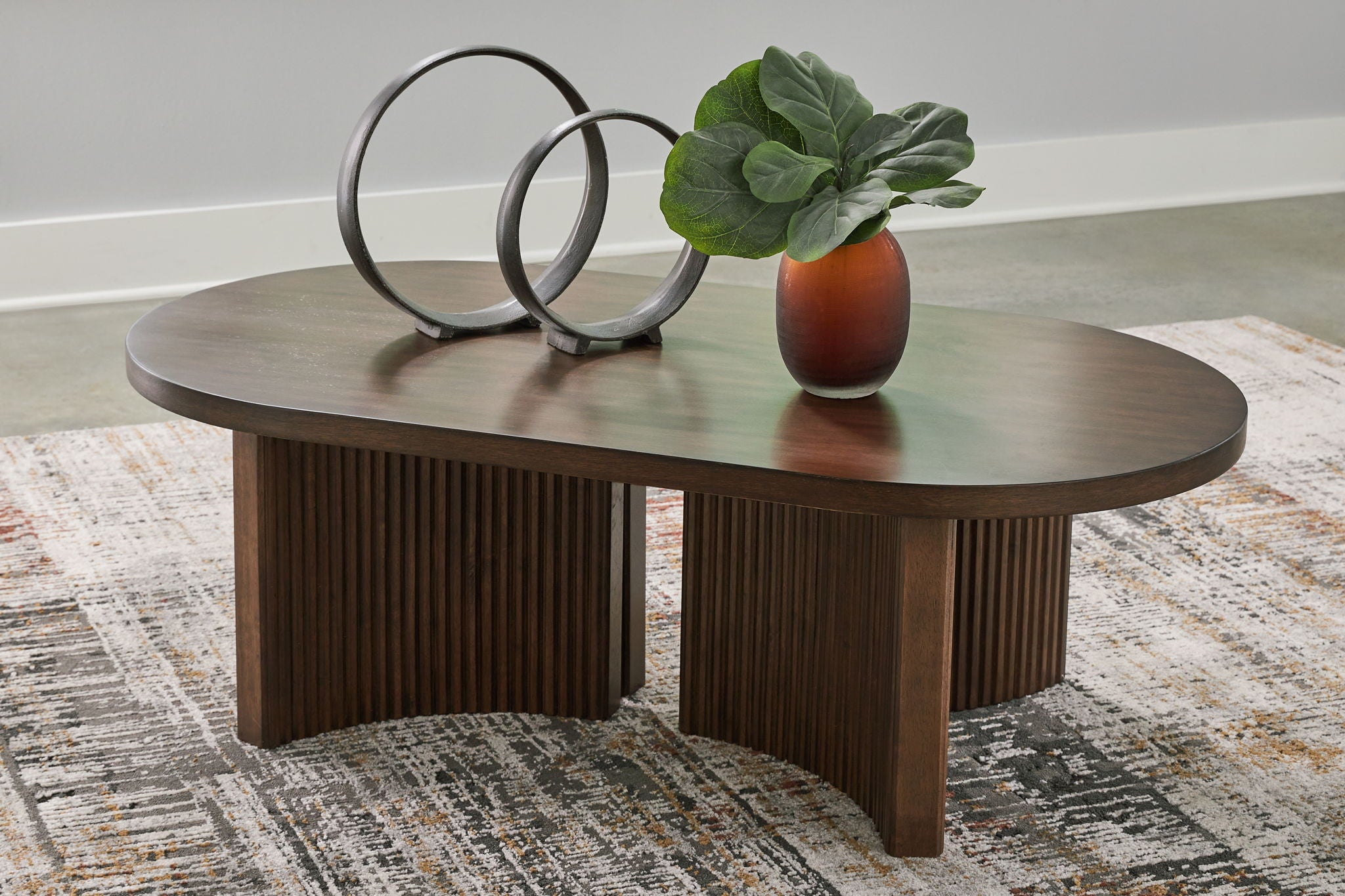 Korestone - Dark Brown - Oval Cocktail Table - Urban Living Furniture (Los Angeles, CA)