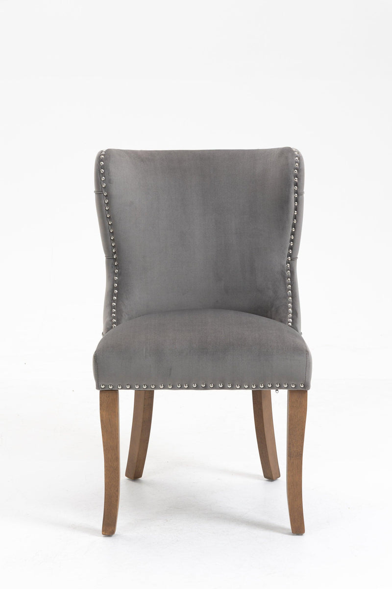 Set of 2 upholstered wing-back dining chair with backstitching nailhead trim and solid wood legs